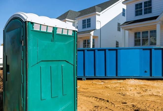 porta potties on a busy construction site, providing necessary facilities